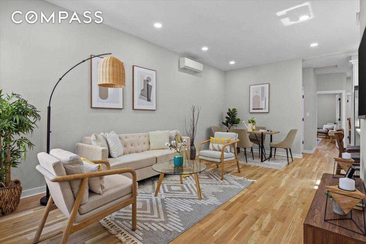 You'll want to move right into this turnkey two family home featuring beautifully gut renovated interiors, three private outdoor spaces, and a wide driveway garage in convenient East Flatbush.