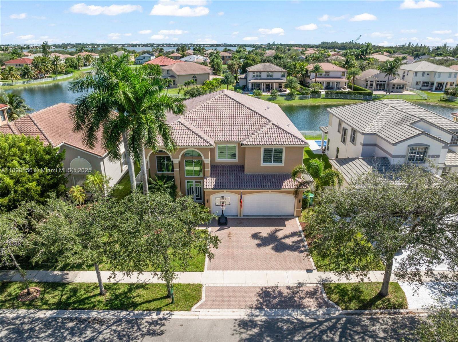 Updated 6 bedroom 4 bath lakefront residence in Sunset Lakes.