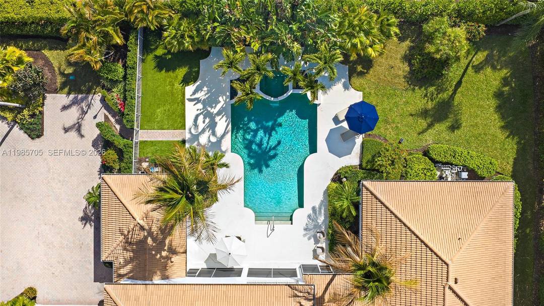 Located on a large lot on the east side of Admirals Cove, this home offers a rare combination of space, privacy, and a full golf membership.