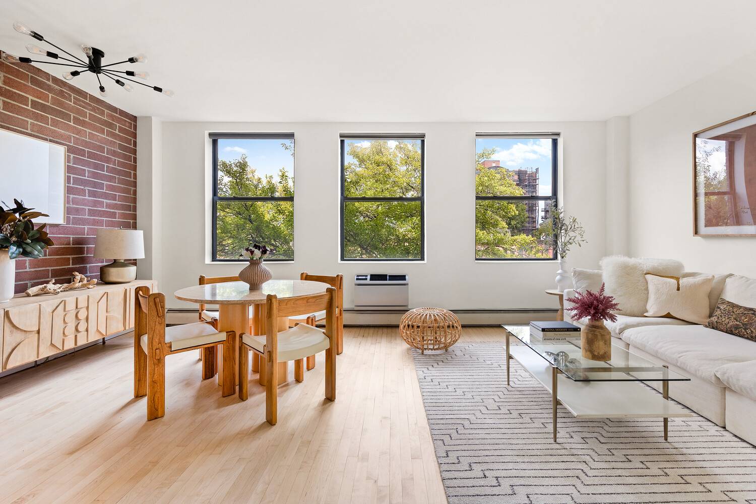 Bright and spacious, this Greenwood two bedroom, two bath condo is filled with sunlight, character, and smart design.