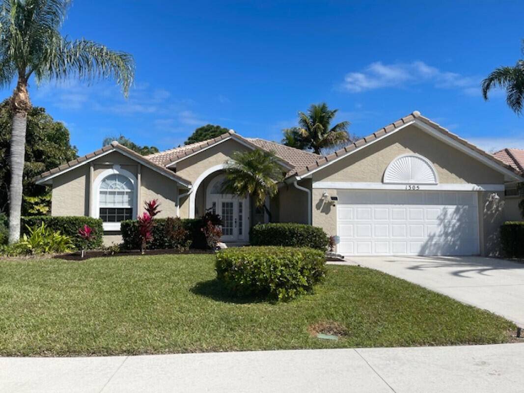 Located in the gated Community of Heatherwood.