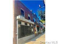 Nestled in the vibrant heart of City Island, this charming mixed use property seamlessly blends residential comfort with commercial opportunity.
