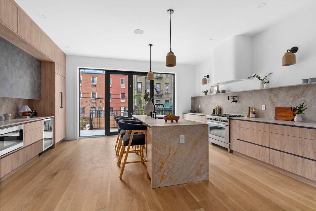 Step into a world of elevated living with this exceptional 20 foot wide, 3, 551 square foot Brooklyn estate a masterfully reimagined two family townhouse that fuses classic elegance with ...