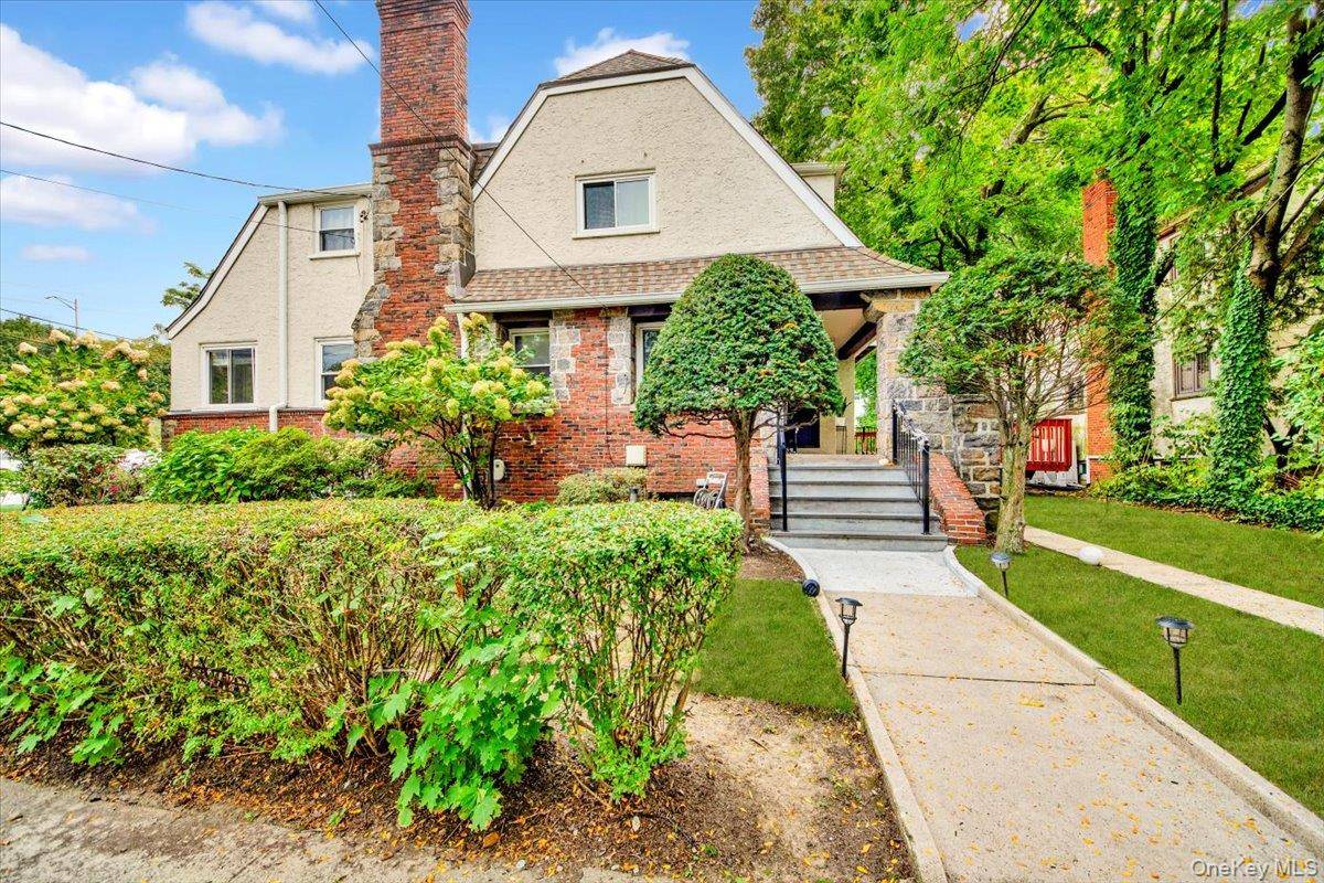 Welcome to 105 Frederick Place a beautifully renovated three level Tudor set on a corner lot that blends timeless charm with modern updates !