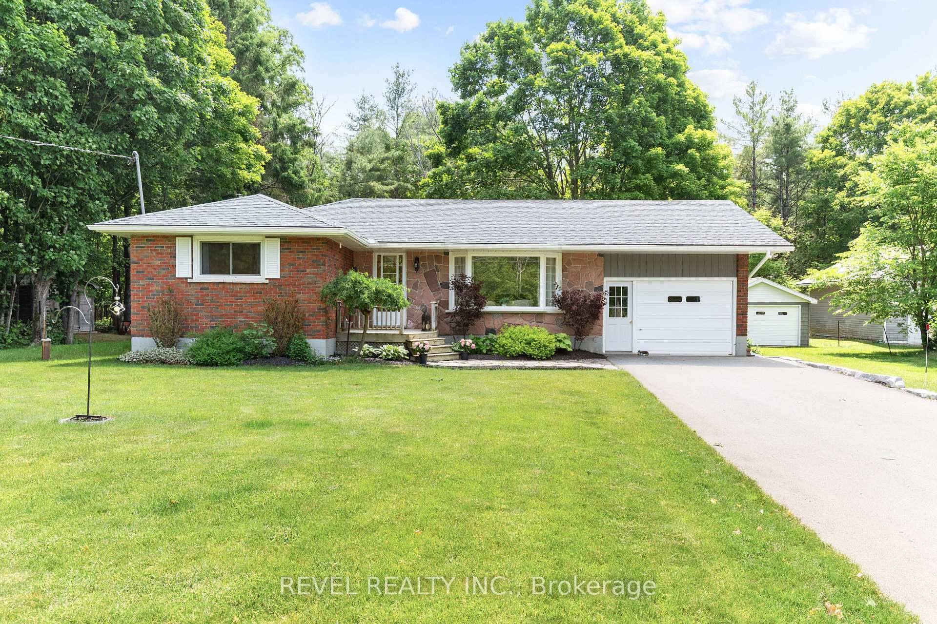 Welcome To 2796 County Road, Coboconk A Charming Brick Bungalow Nestled On A 105 x 200 Ft Lot Backing Onto Crown Land.