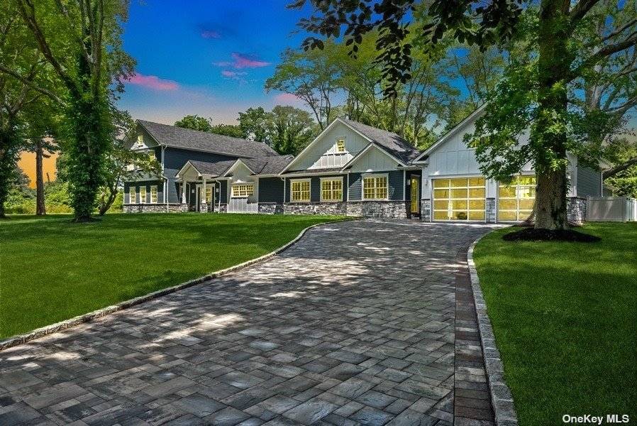 Luxury awaits as you drive to the end of the private road to this fully renovated and expanded home on a spectacular 2.