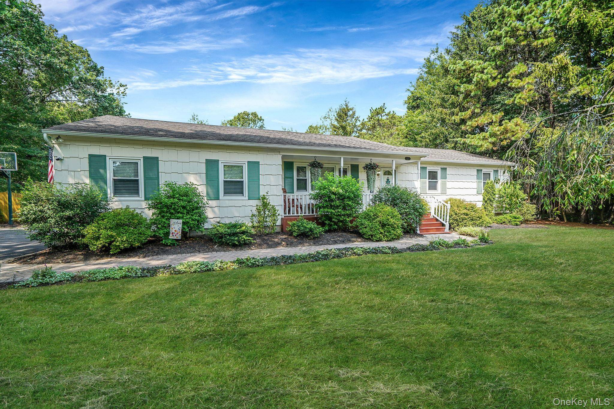 Set on a private 1. 1 acre horse property in Miller Place, this home blends space, privacy, and warm character.