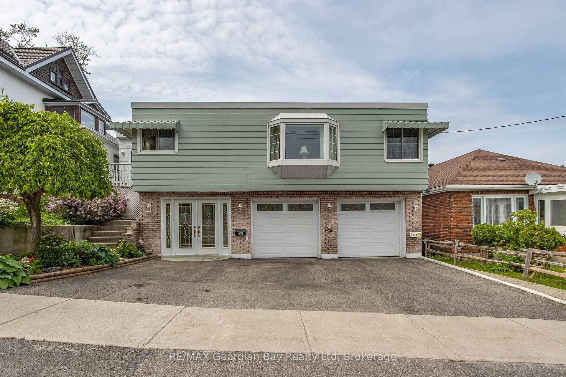 This is a charming 4 bedroom, 4 bathroom, low maintenance duplex in a heart of downtown Midland.