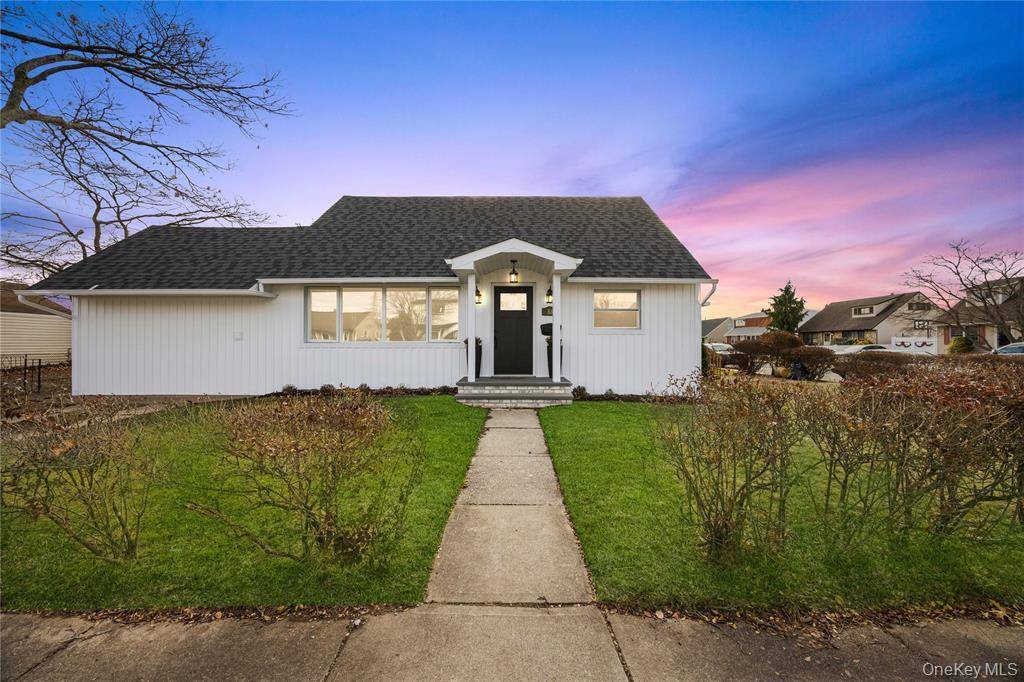 This fully renovated expanded Cape style corner house offers modern living with exceptional convenience.