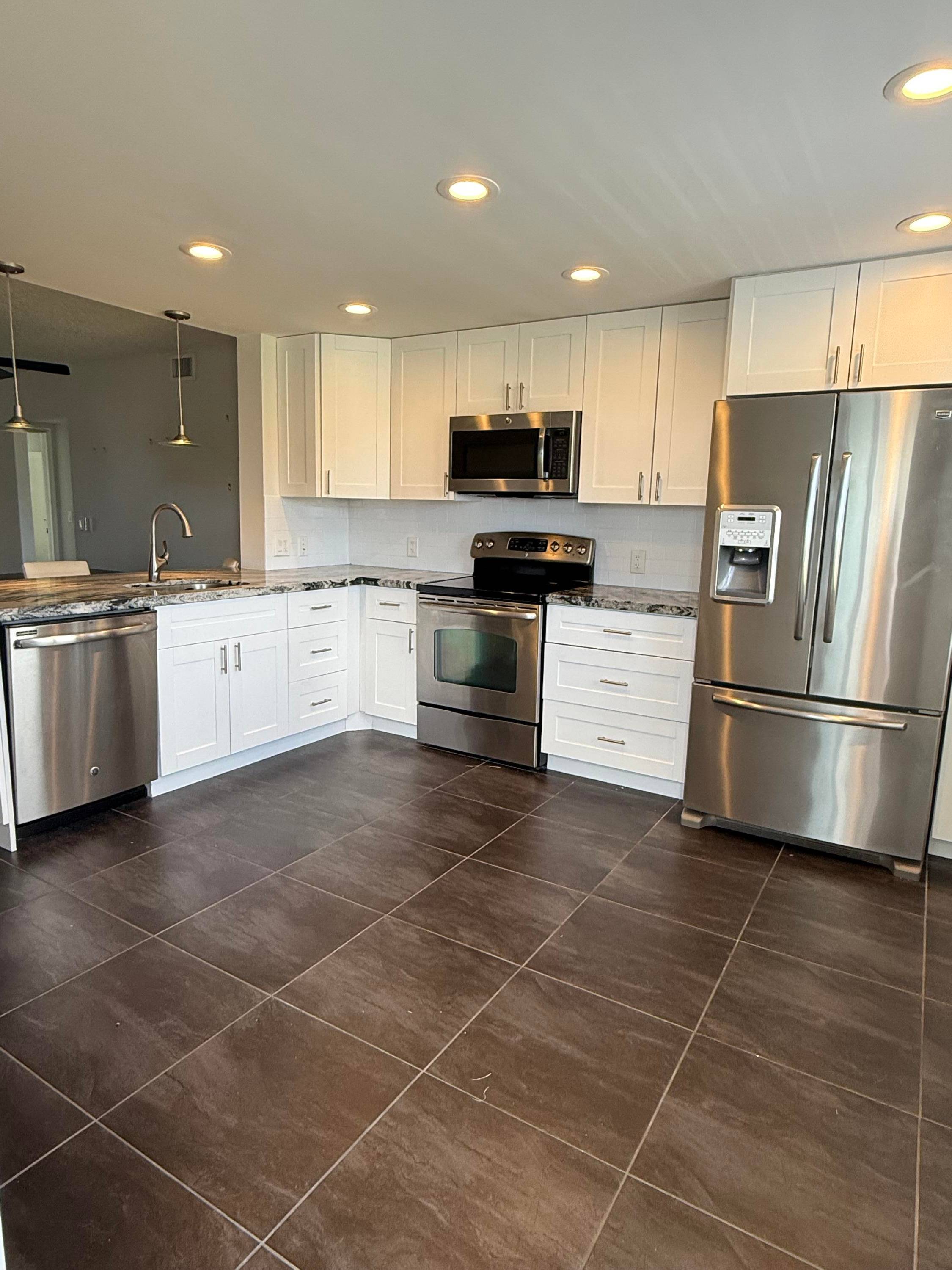 VERY RARE FULLY UPDATED CORNER CONDO.