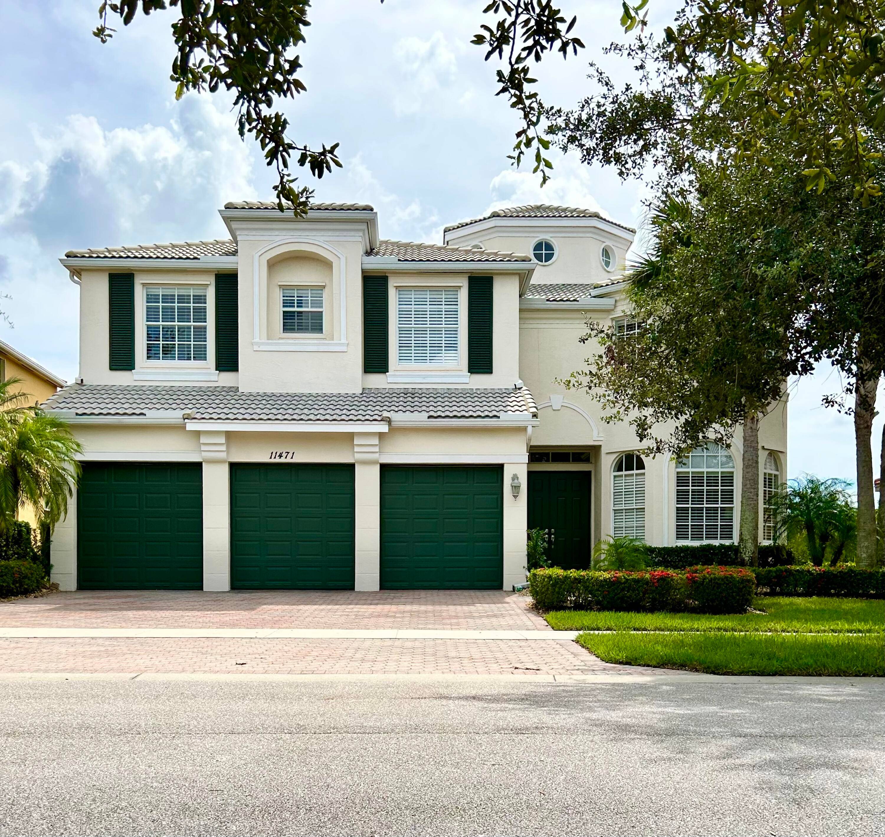 This spectacular 5 bedroom, 5 1 2 bath, 3 car garage Charleston model home in the desirable gated community of Town Park at Tradition is a sight to see.