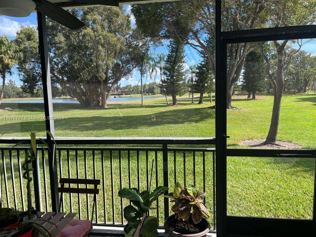 GROUND FLOOR UNIT WITH WONDERFUL GOLF WATER VIEW !