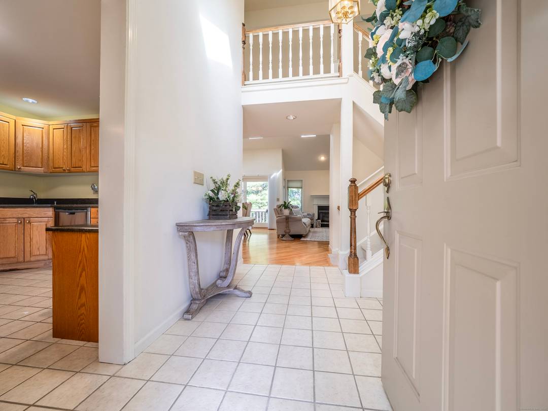 This welcoming three bedroom Lake Place condo immersed in bright light with vaulted ceilings and open floor plan is not to be missed.