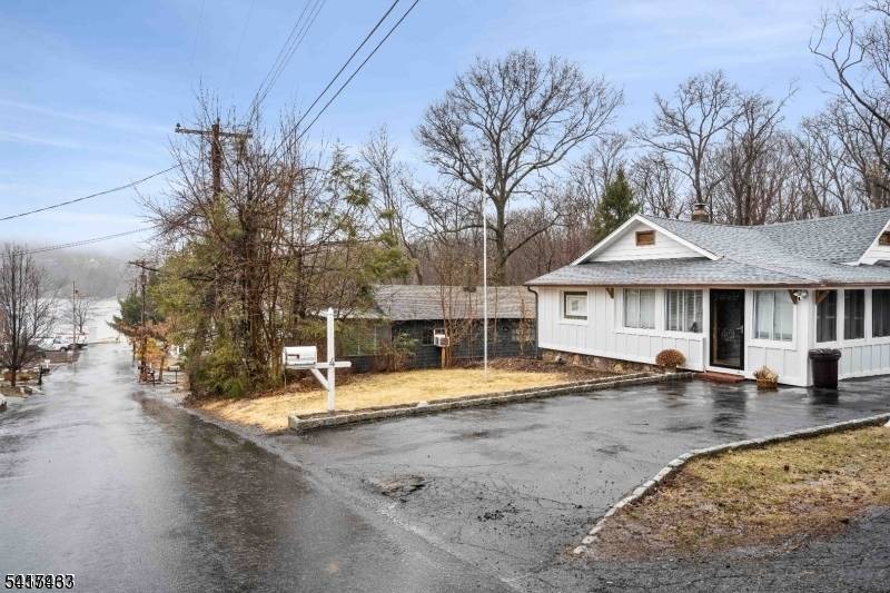 Vacation year around in this renovated two bedroom, two and a half bath home in one of New Jersey's most sought after private lake communities !