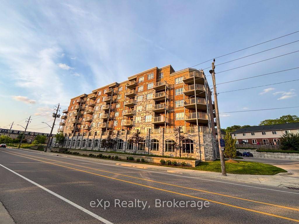 Incredible sunset views of the Grand River from your spacious 1 Bed den unit at 155 Water St.