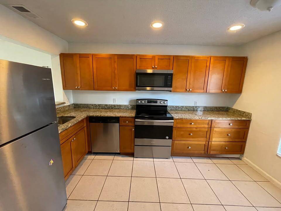 This two story townhouse, located in a well established all ages community in West Palm Beach, is currently part of a portfolio of four investment properties.