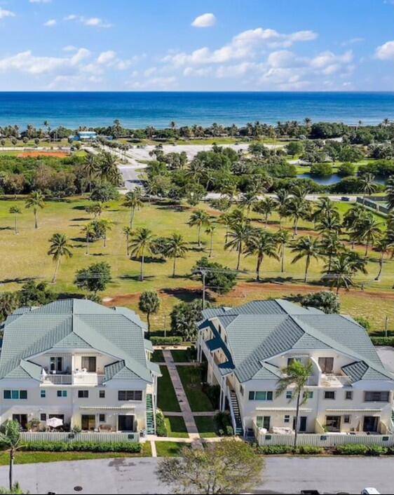 INVESTORS DREAM ! Back patio view of Carlin Park and the Ocean just a short walk to the Ocean !