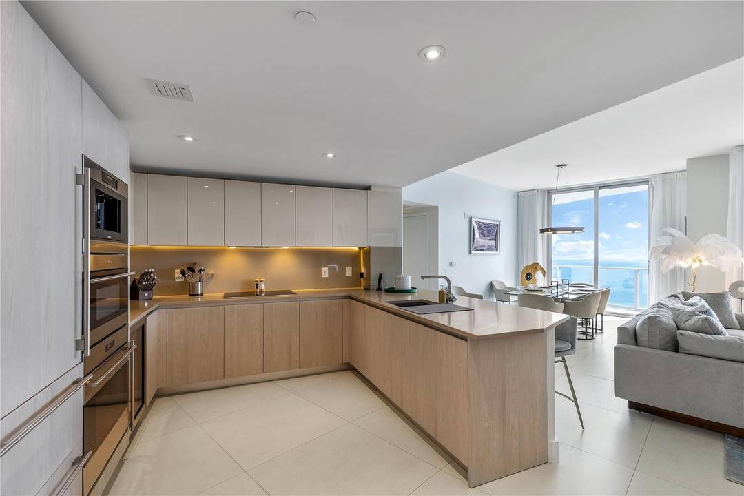 Spectacular one of a kind combined residence, 4 bedroom lower penthouse facing SE in full resort style condo hotel building with NO RENTAL RESTRICTIONS.