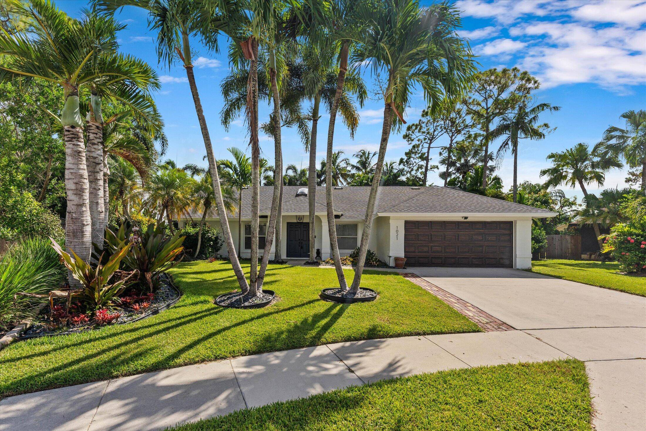 Move right in to this stunning 4BR 2BA pool home in Sugar Pond Manor, tucked away on a quiet cul de sac for ultimate privacy.