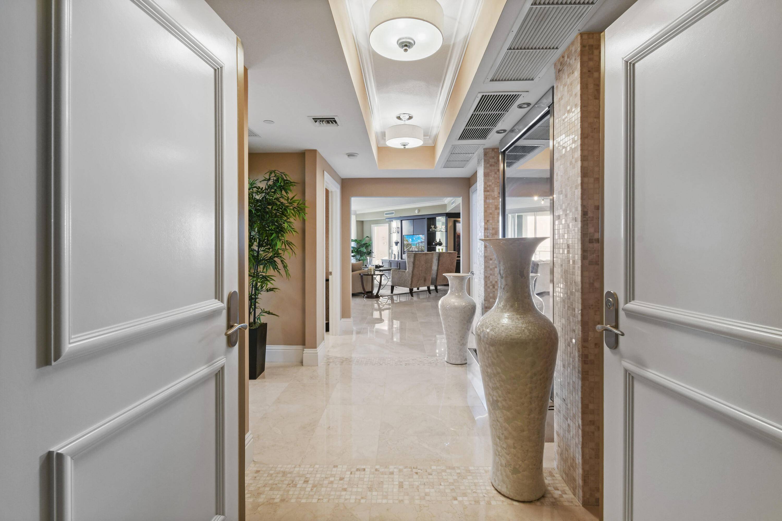 Experience unrivaled coastal luxury in this exquisite 3 bedroom, 3.