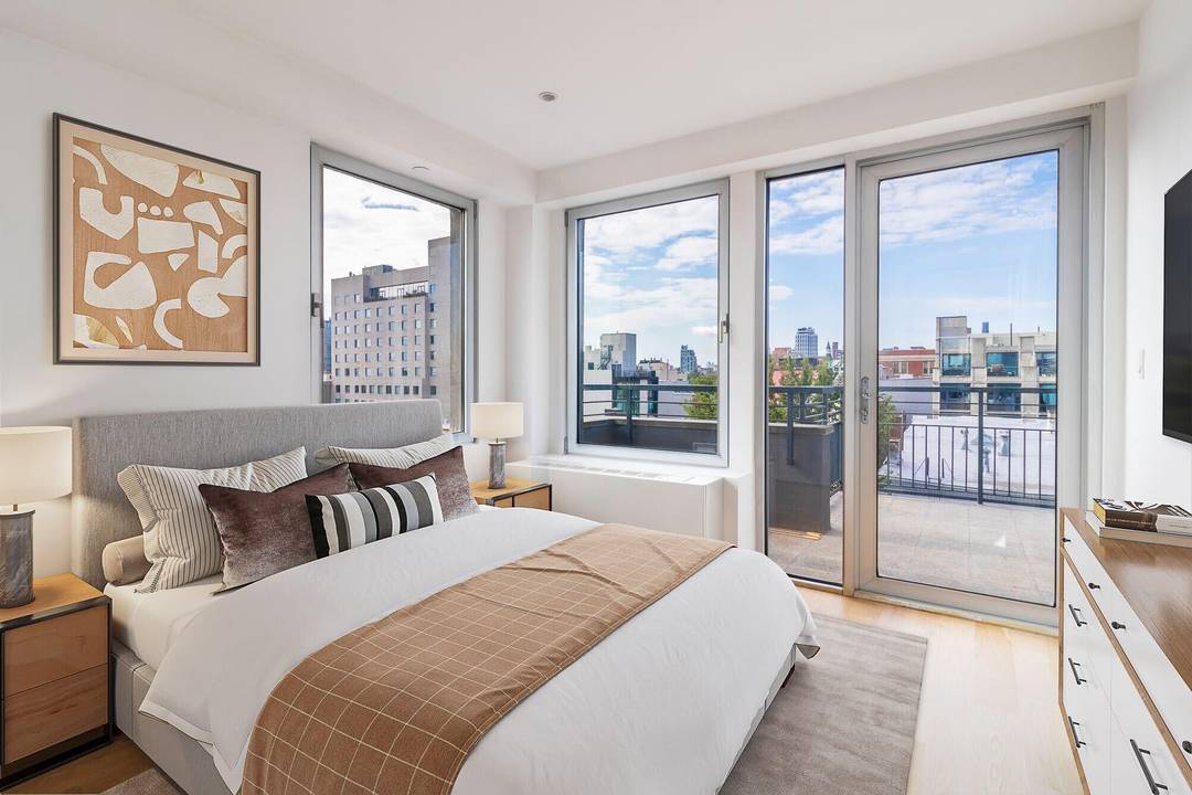 Ultra Rare PENTHOUSE with 2 massive terraces and indoor PRIVATE PARKING spot in the heart of prime Williamsburg !