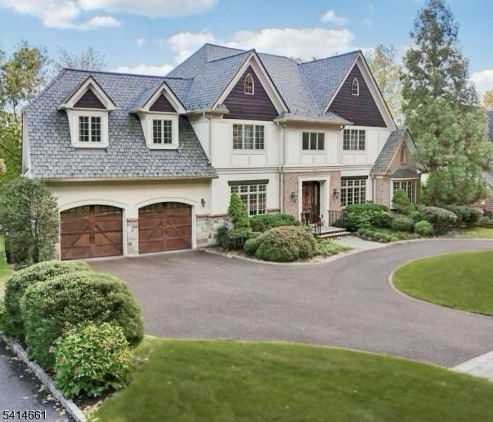 Welcome to 910 Highland Avenue, a beautifully crafted custom Tudor nestled in Westfield's iconic Gardens neighborhood.