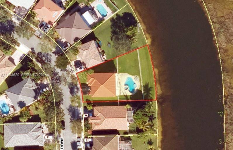 NEWLY RENOVATED LAKEFRONT VESPER MODEL POOL HOME THE SANCTUARY at PEMBROKE ISLES Features a Remodeled Kitchen, Contemporary Raised Panel Wood Cabinetry, Granite Countertops, Stainless Steel Appliances, Serving Bar, Spacious 2nd ...