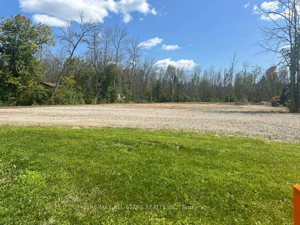This ideal half acre building lot is perfectly situated on a back lot just off of River Rd with a municipal access point to the burnt river.