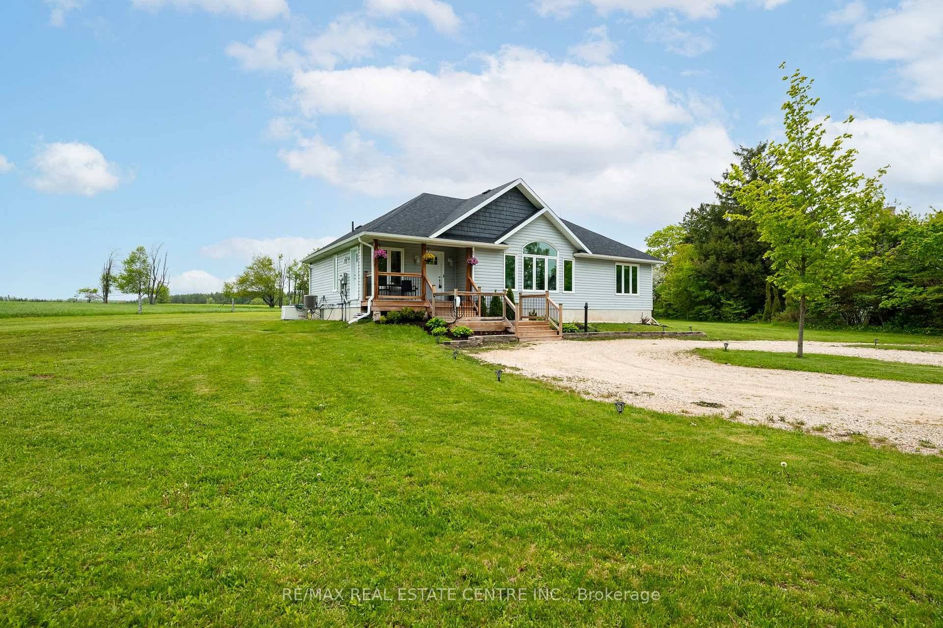 Nestled in the peaceful hamlet of Riverview, where the Grand River winds through wide open landscapes, this modern raised bungalow offers an inviting blend of comfort and country charm.