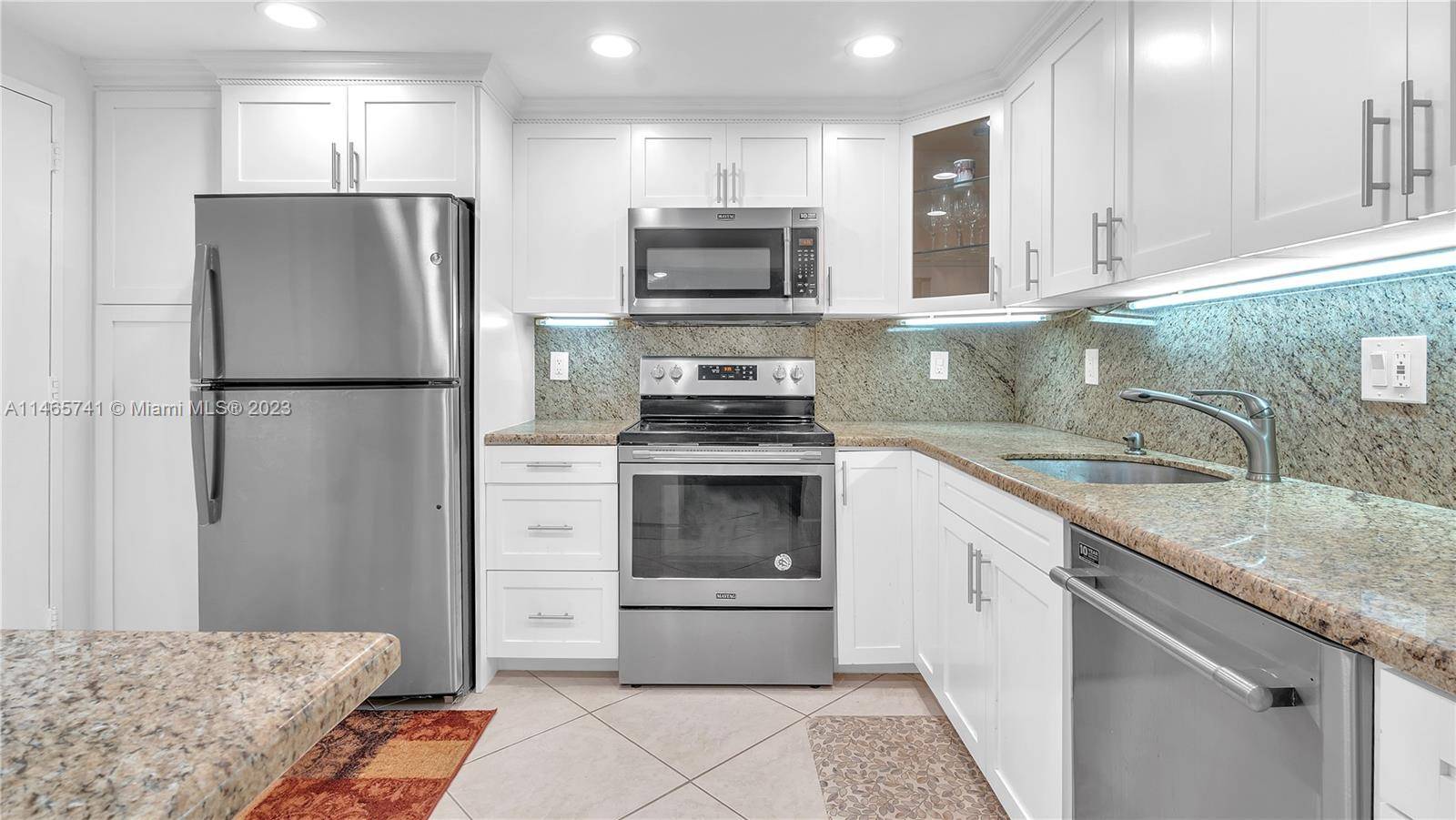 Stainless Kitchen In unit Laundry Pool Fitness Club Bright airy 2 bed 2 bath condo right across from the beach.