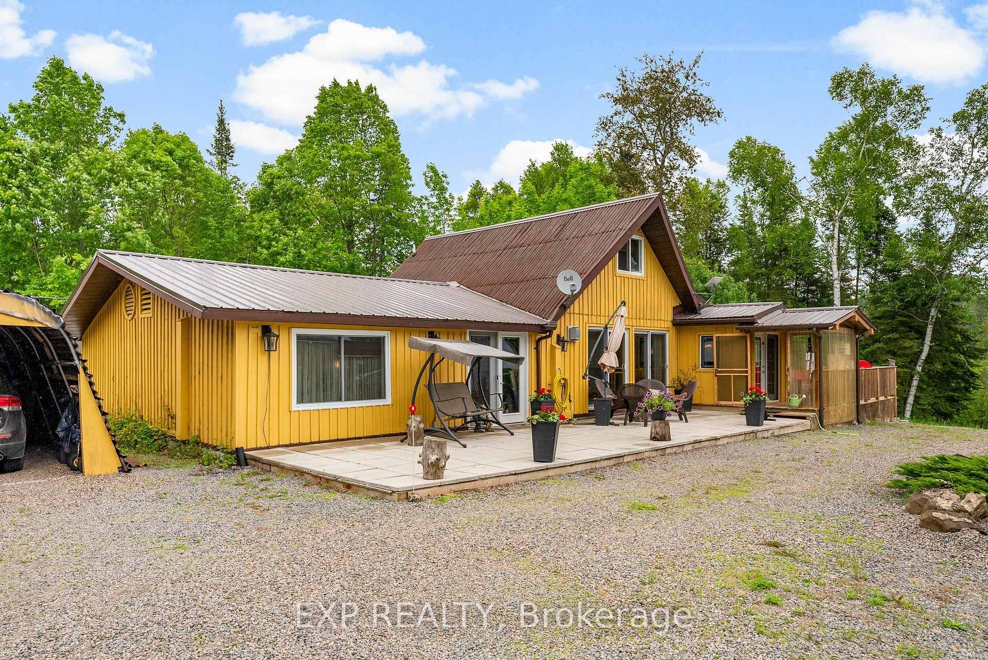 Tucked away down a long driveway off a quiet township road, this stunning 11 2 storey home offers the ultimate in peace, privacy, and natural beauty on 17 acres of ...