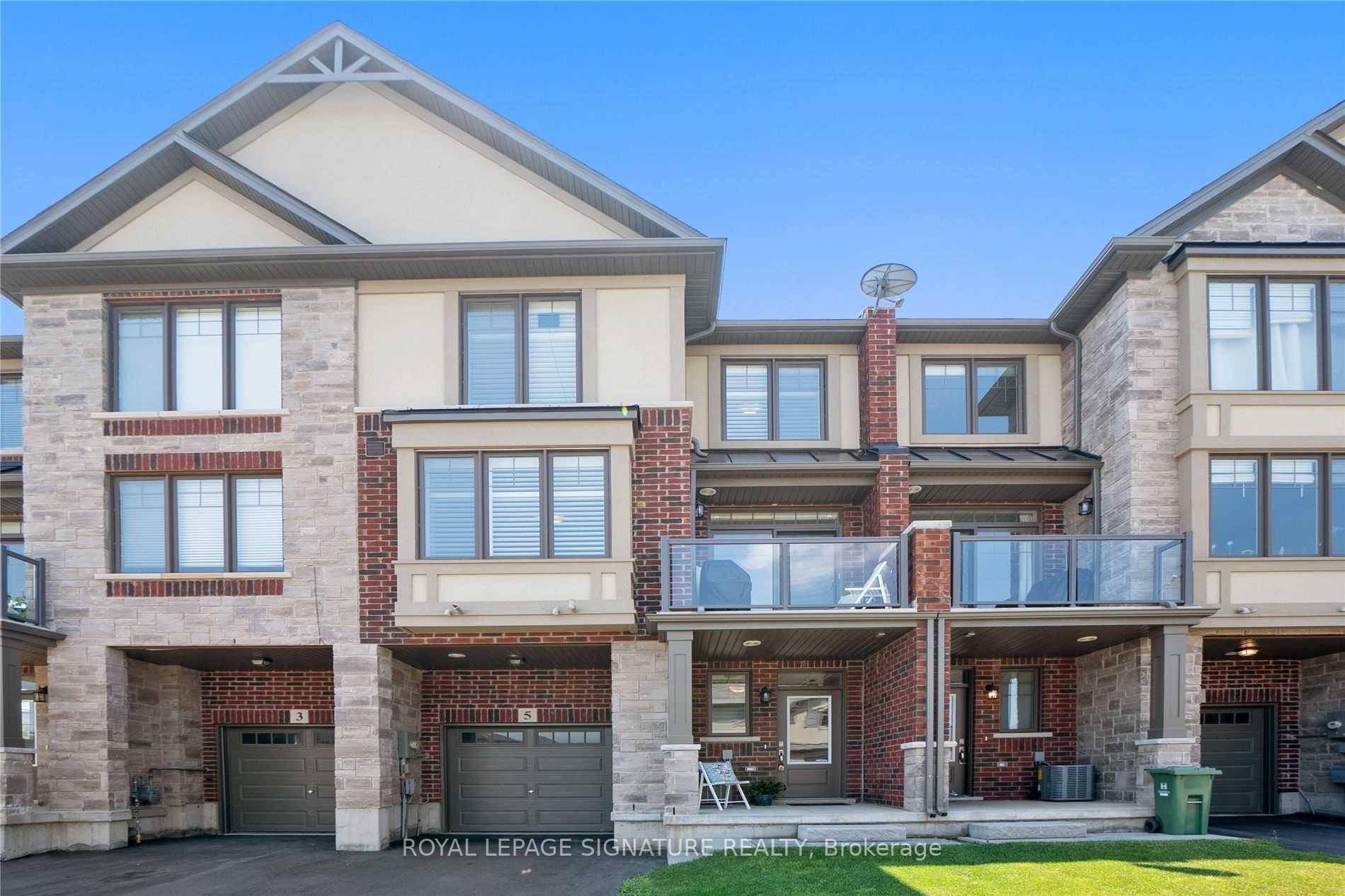 This 3 story townhome stands out with its private location no homes directly in front and one of the longest driveways in the complex.