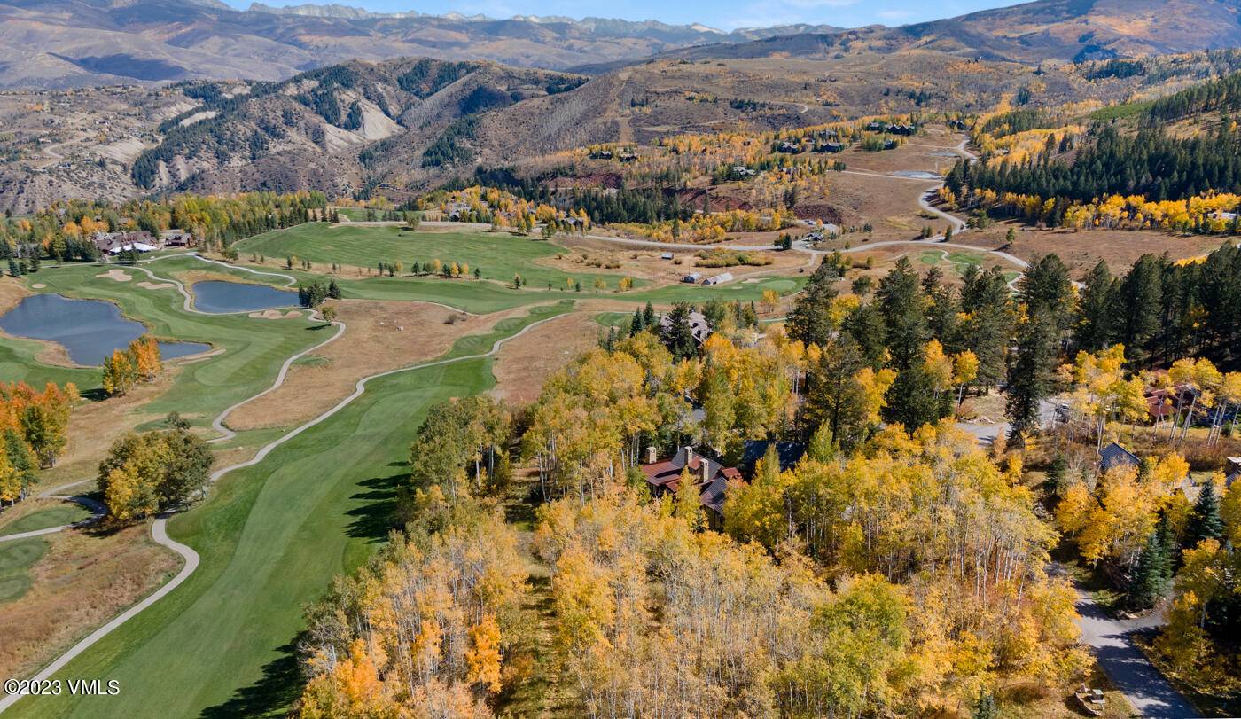 Perfectly nestled on gentle sloping land, this stunning homesite overlooks the 12th fairway of the Cordillera Mountain Course.