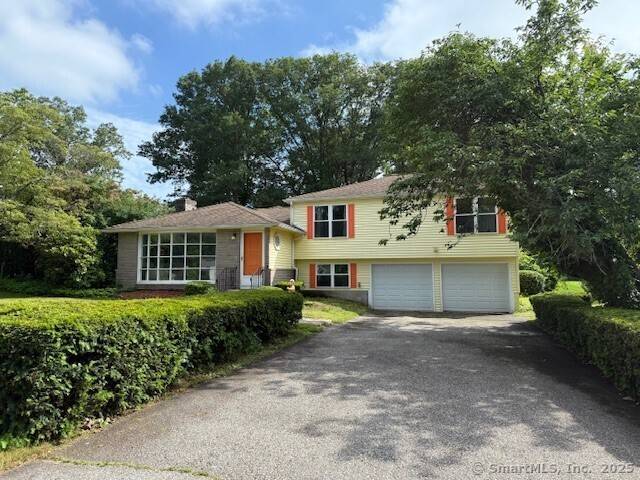 BRAND NEW SEPTIC SYSTEM. Convenient Orange location, 1, 957 Square foot split level.