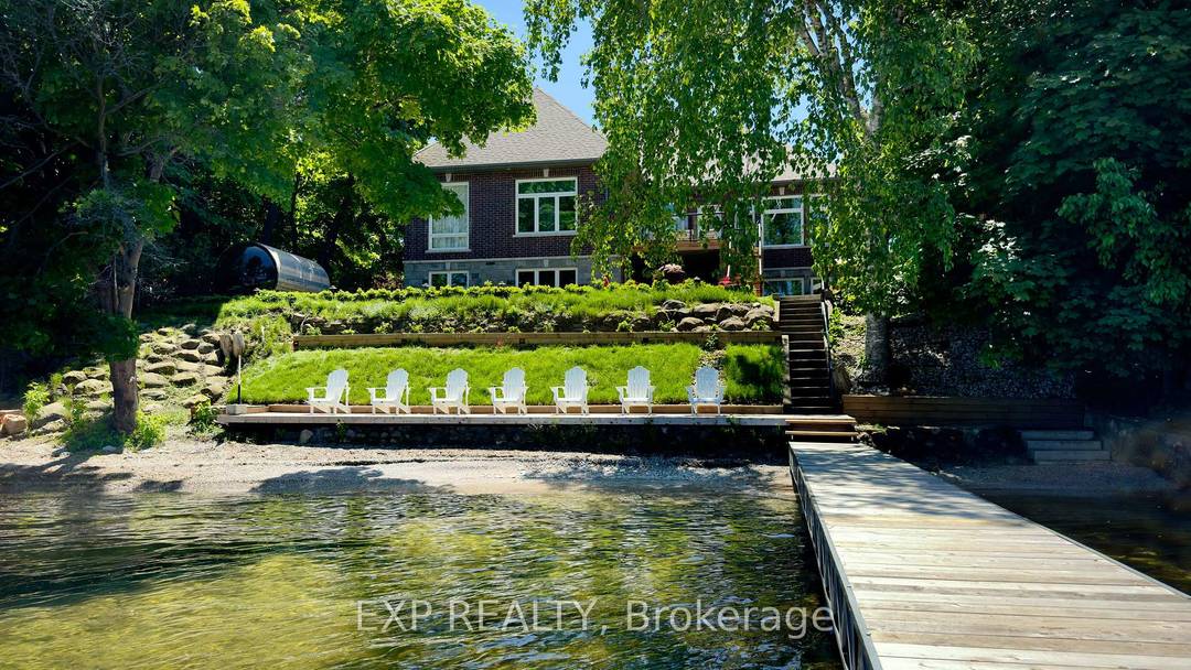 A Truly Exceptional Coastal Inspired Luxury Waterfront Bungalow Featuring 7 Bedrooms amp ; 8 Bathrooms, Fully Renovated And Sold Completely Furnished, Offering Approximately 6, 800 Sq Ft Of Thoughtfully Designed ...
