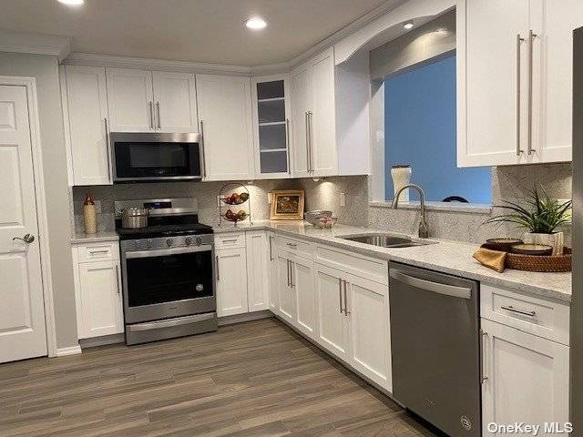 Gated Luxury 55 Rental Townhouse Community w waterfall entry.