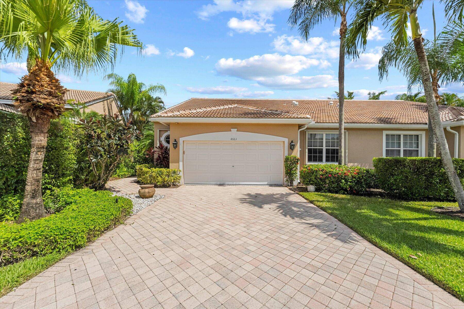 Discover your dream retreat nestled in the prestigious Cambridge neighborhood of Wycliffe Golf and Country Club !
