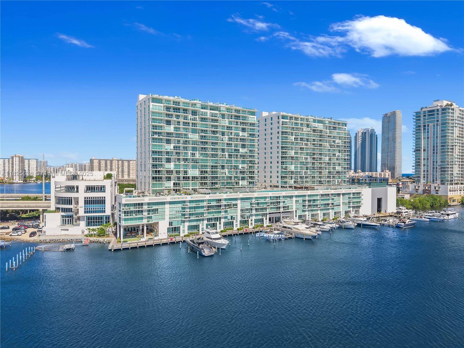 Perched above the Intracoastal in Sunny Isles Beach, this upper level 3BD 3BA residence at 400 Sunny Isles blends panoramic water and skyline views with refined modern design.