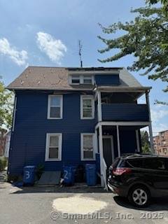 Two family with a third level on a corner lot.