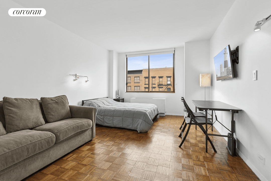 Welcome to Residence 3M at 393 West 49th Street, a delightful and sun drenched condo nestled in the vibrant Midtown West neighborhood.