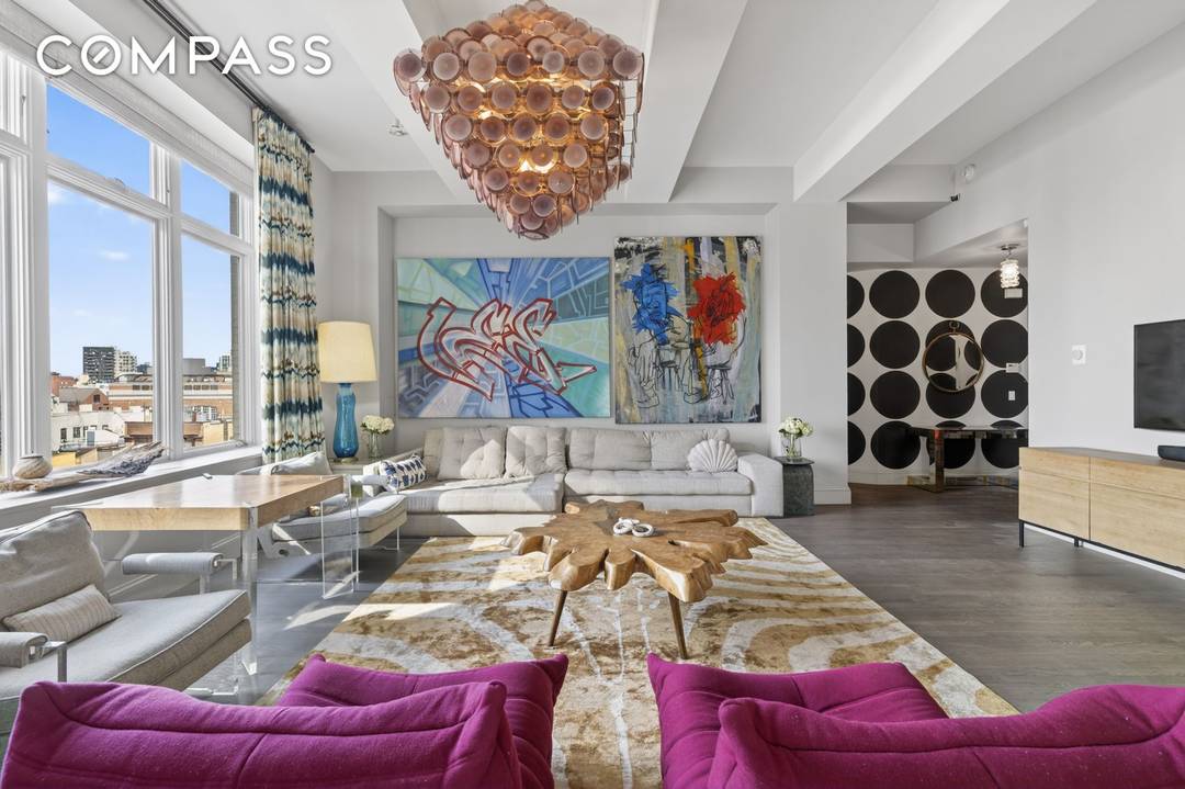 A True Downtown Loft A true downtown loft with an artistic sensibility, this expansive residence is defined by 12 foot beamed ceilings, hardwood floors, and a scale rarely achieved today.