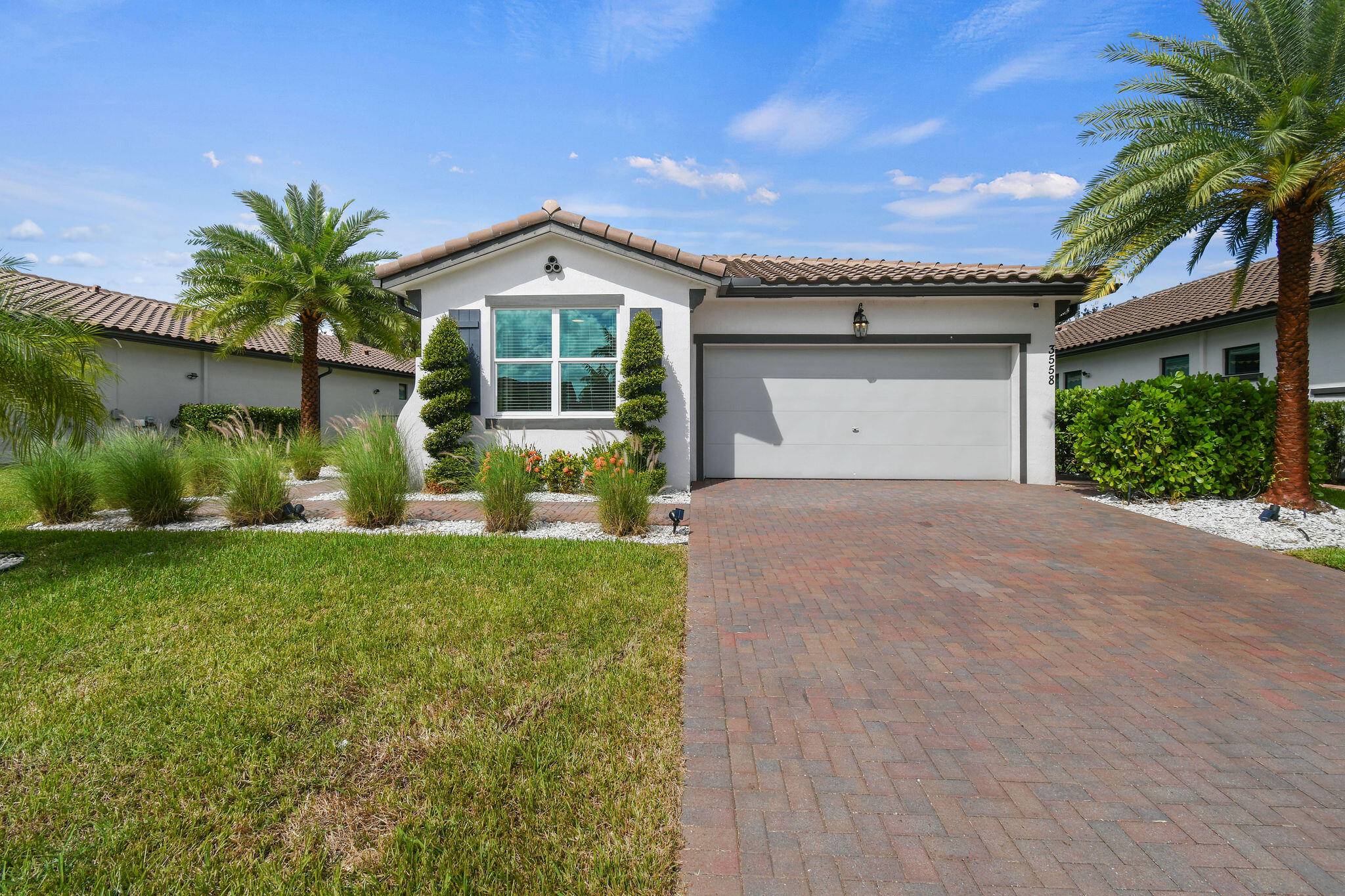 This beautifully appointed 3 bedroom, 2 bathroom residence with a 2 car garage offers the perfect opportunity for year round living just seven minutes from the equestrian heart of Wellington.