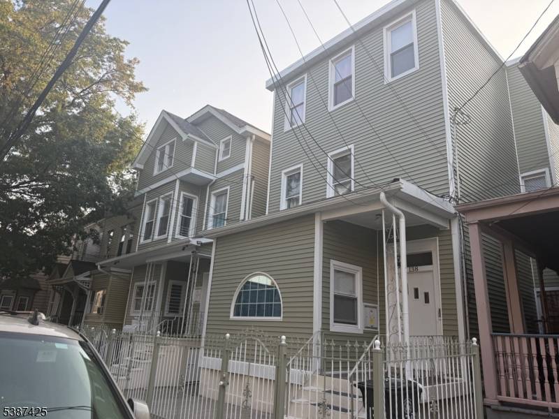Great Income property this Lovely 3 fam house has a updadted kitchen on 1st unit each apt has their separate air conditioner and forced hot air.