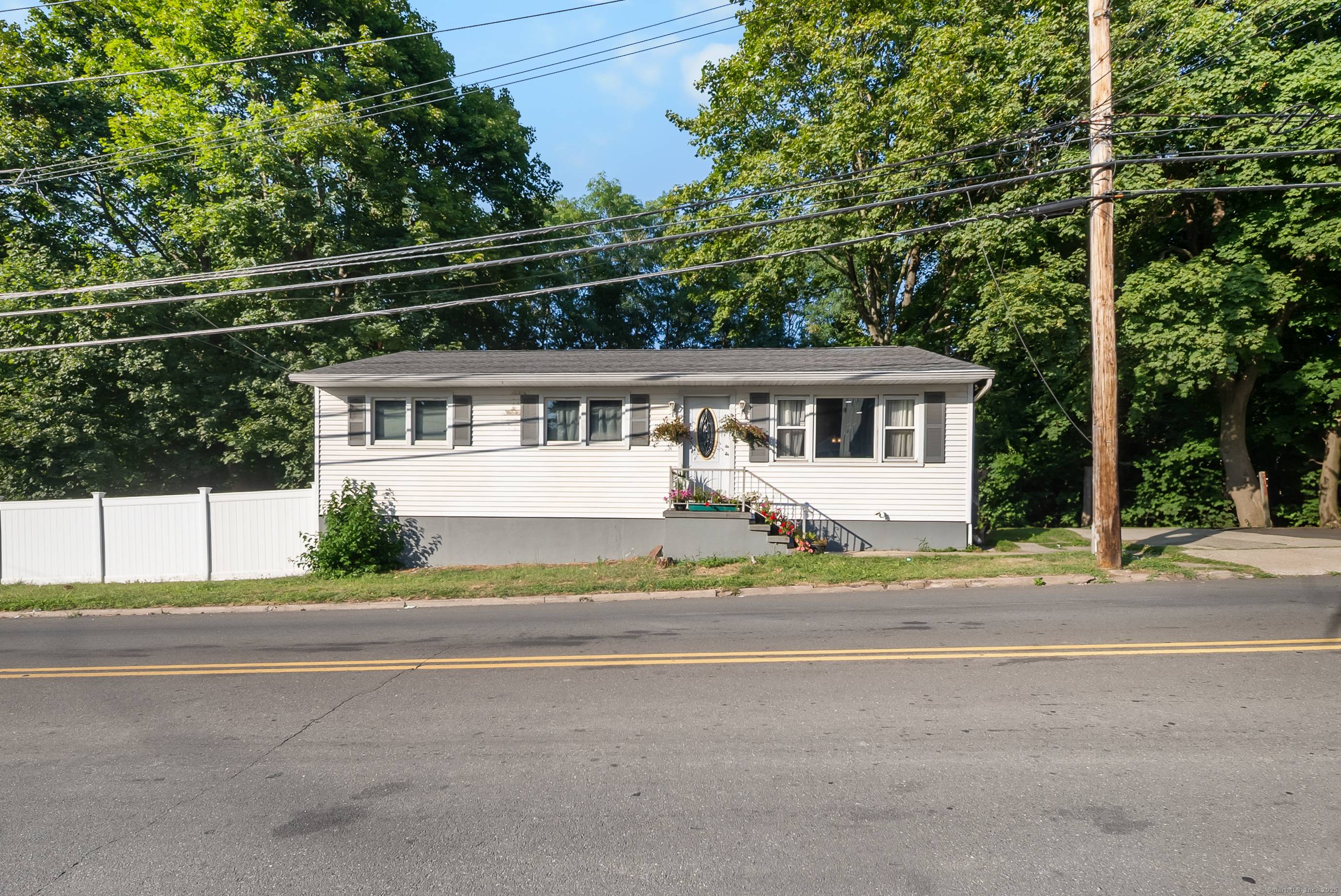 Modern 2 family house for sale, fully renovated and equipped with central air, on demand water heater, gas, and a private driveway and entrace for each unit.