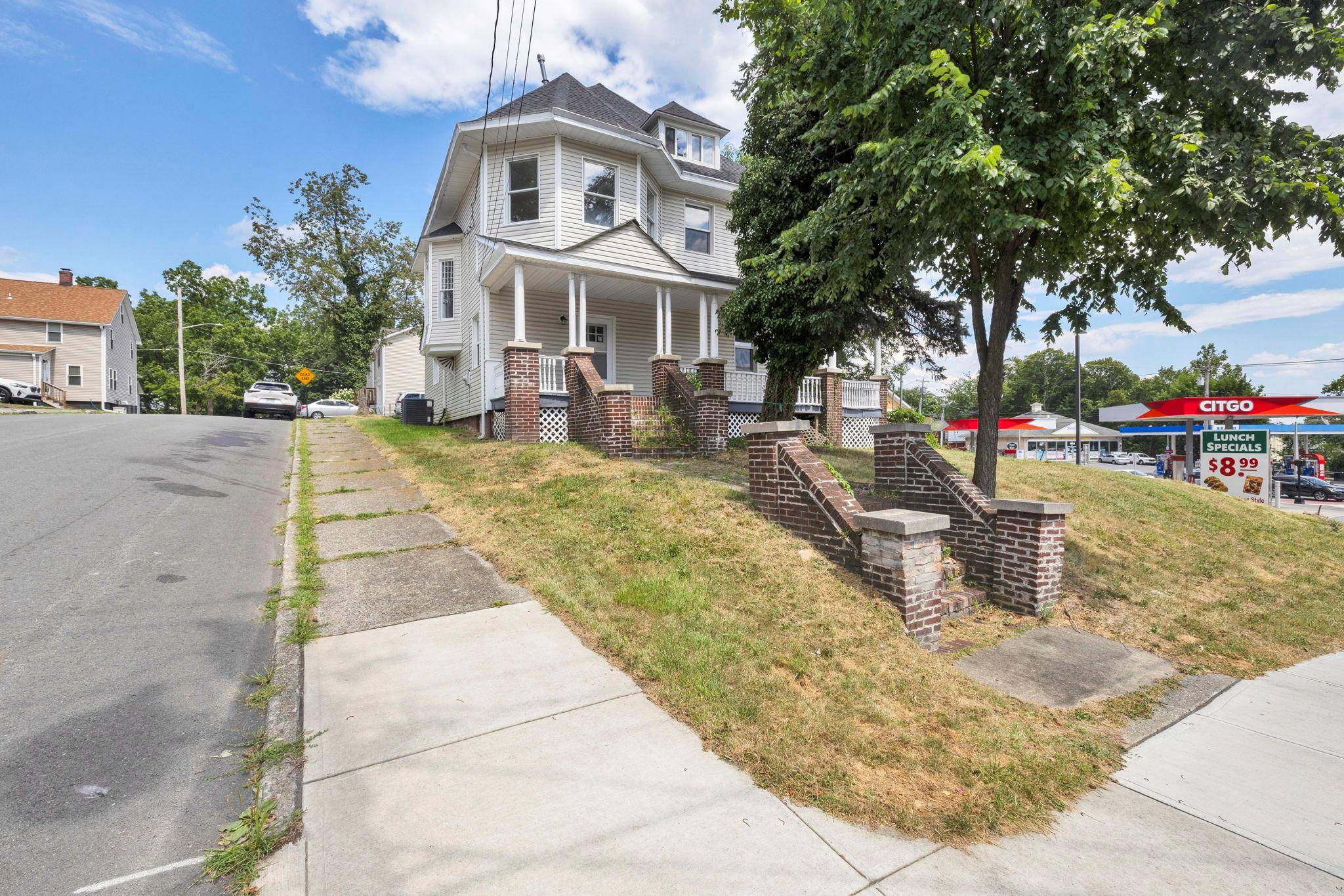 Step into timeless charm with this beautifully renovated Victorian style home !