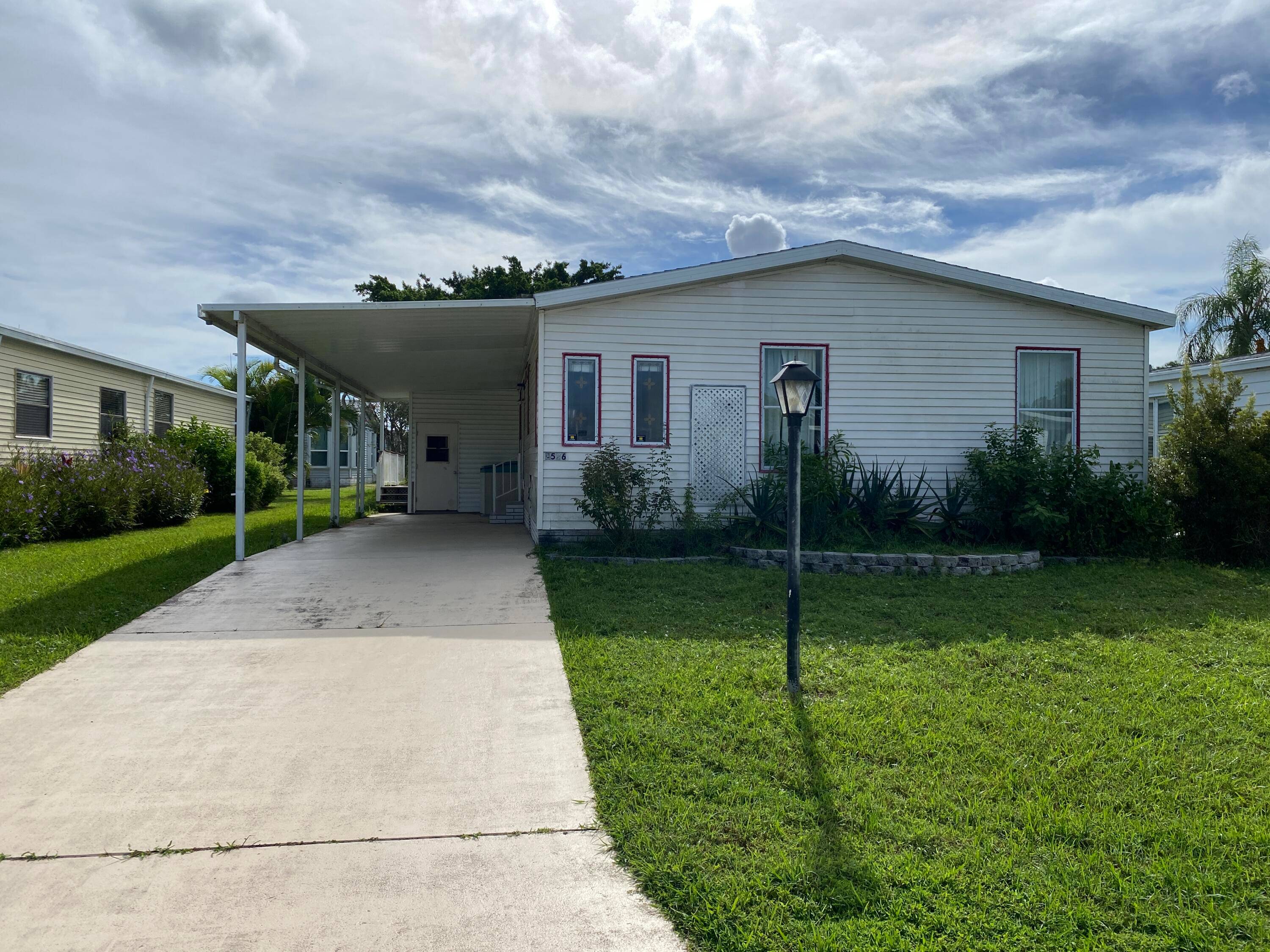 Mobile home located in Savanna Club where you own the land !