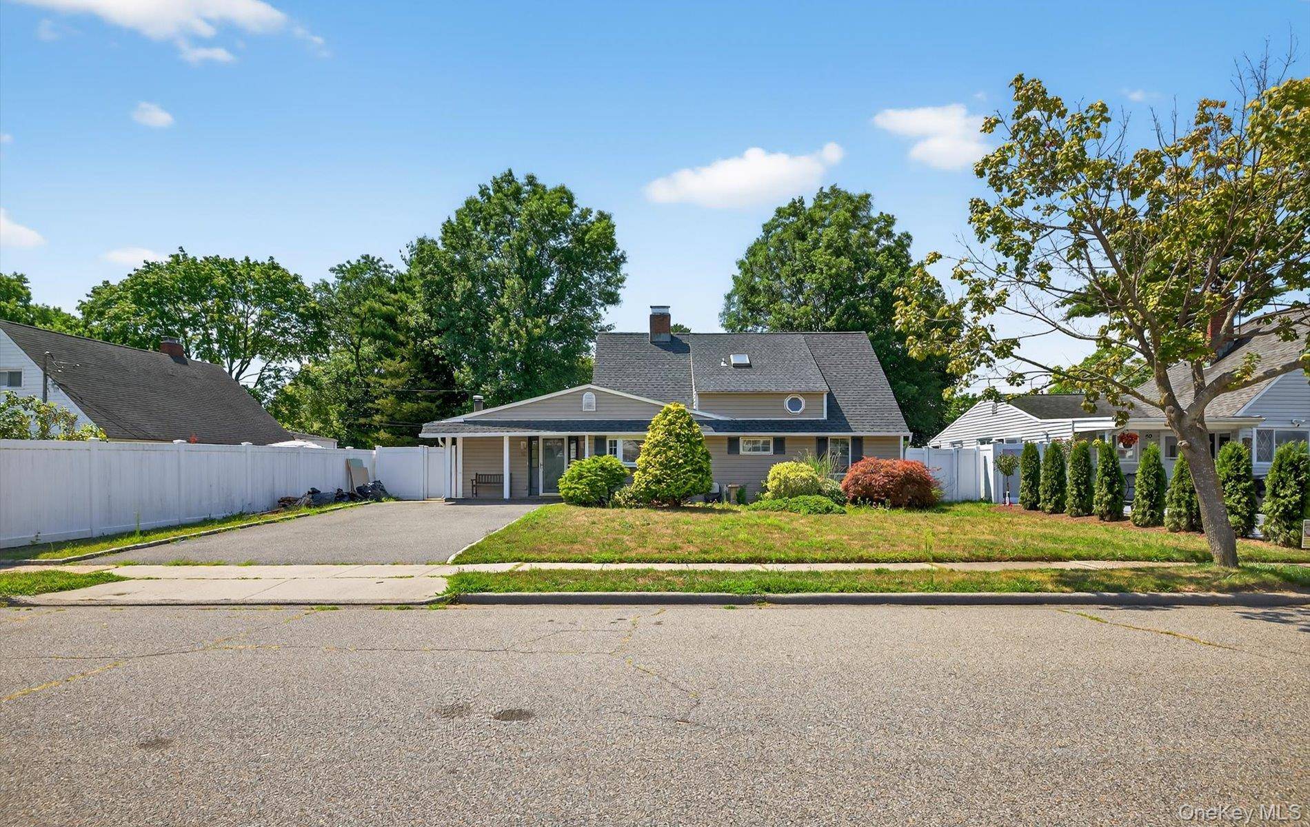 Move right into this Beautiful And Sunny House On a Quiet Tree Lined Street.