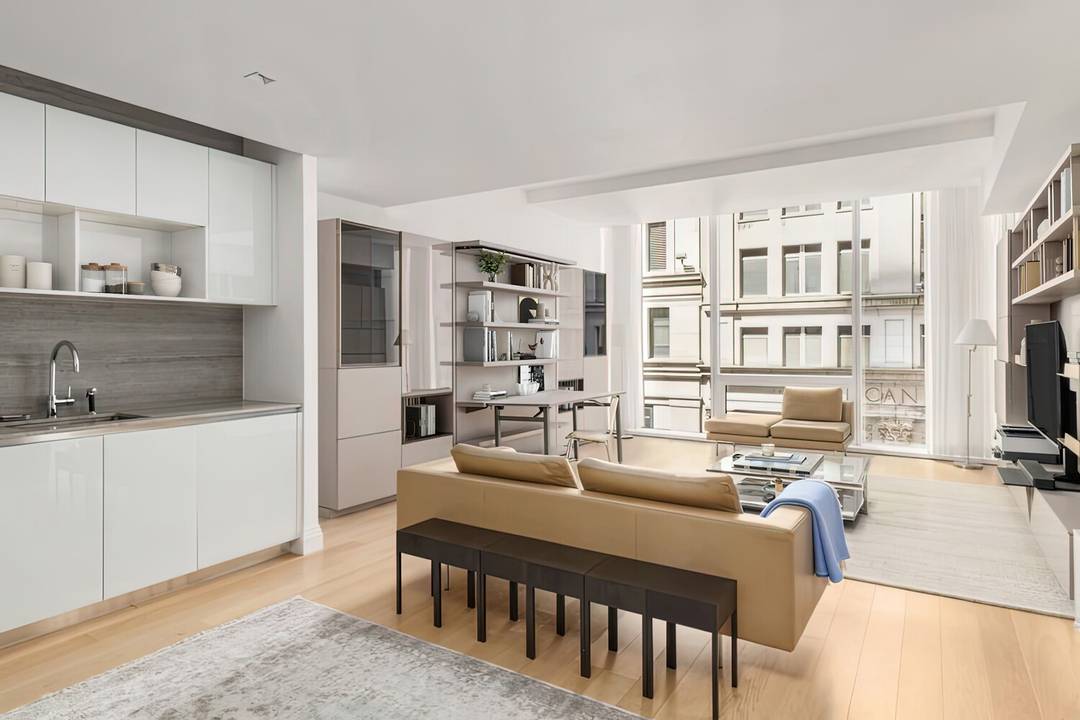 PRINTEMPS PIED A TERRE Enjoy Loft Like Living in Unit 607 ; roughly 800 Square Feet and fully FURNISHED.