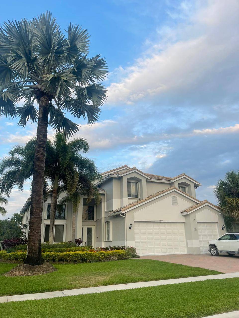 Spacious and elegant, this stunning home features a large family room with a triple slider that opens to breathtaking views of the pool and serene lake, plenty of nature.