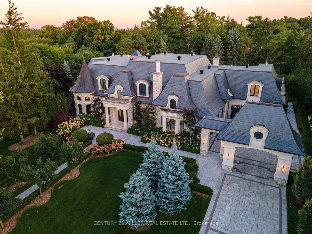 Exquisite French Parsian Home in coveted Woodland Acres.
